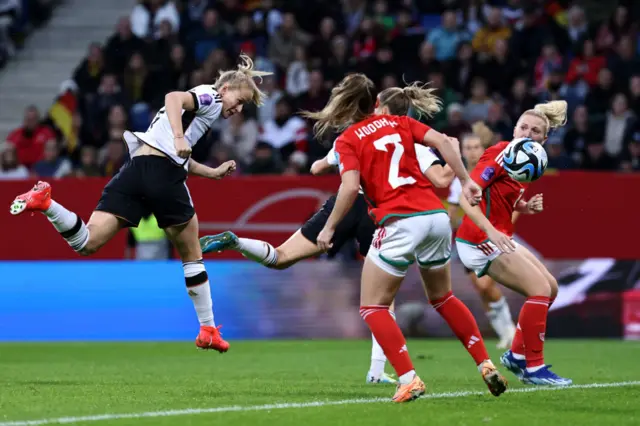 Lea Schuller of Germany heads in the first goal