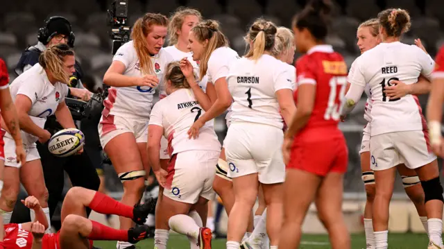 England celebrate a try against Canada