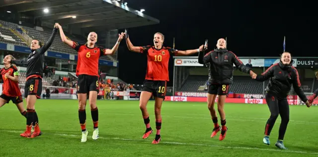 Belgium players celebrate their win over the Netherlands.