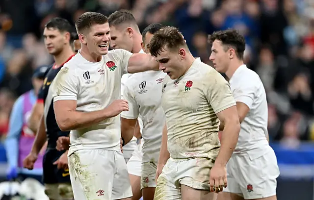 Theo Dan of England celebrates with Owen Farrell