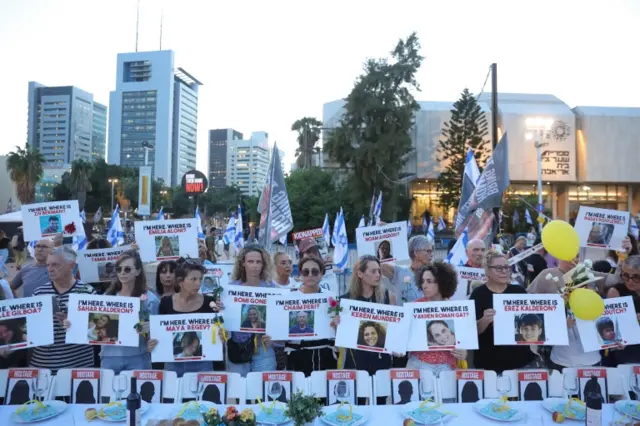 Relatives of Israelis taken hostage by Hamas call for their immediate release from Gaza at a protest in Tel Aviv.