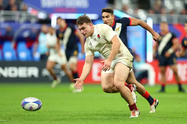 Theo Dan of England attempts to control the ball