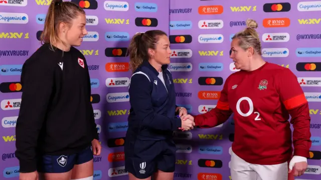 Captains and referee meet before kick-off