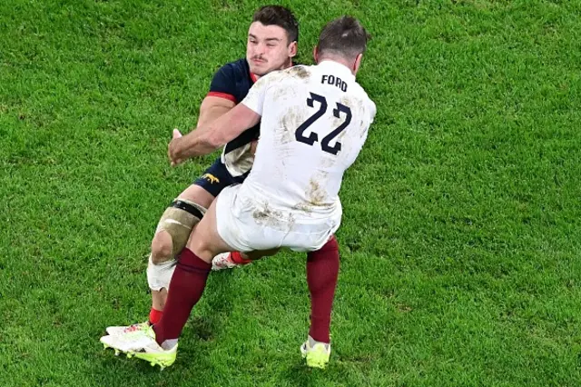 Argentina's left wing Mateo Carreras is tackled by England's fly-half George Ford