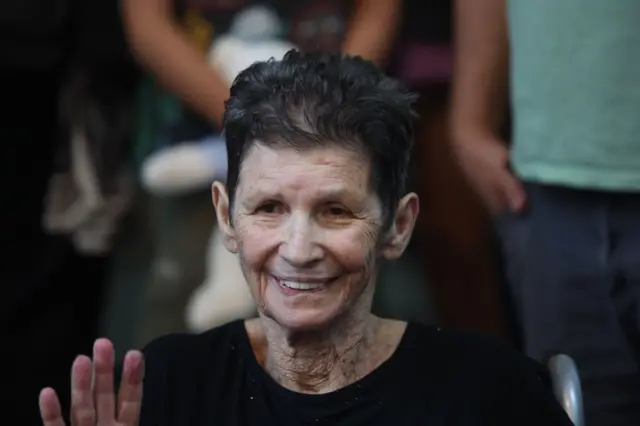 Yocheved Lifschitz, 85, reacts as she arrives to speak with the media after being released by Hamas