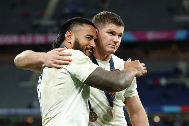 Manu Tuilagi and Owen Farrell of England celebrate victory