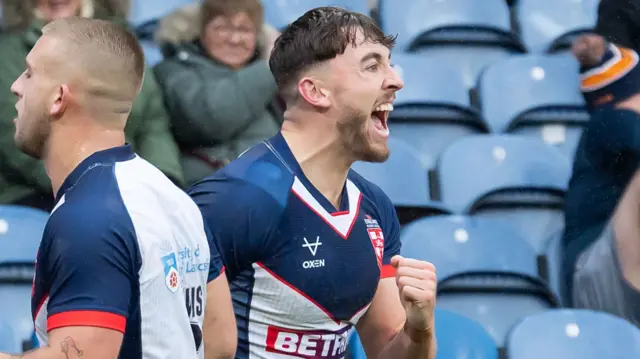 Matty Ashton celebrates