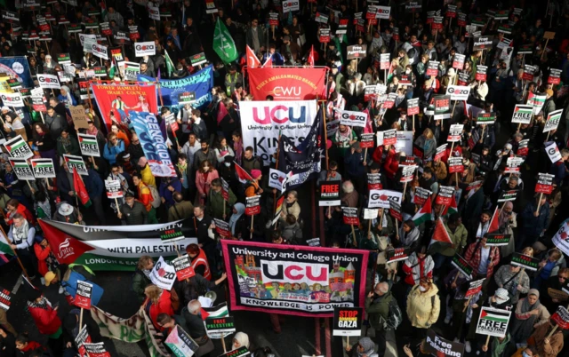 Demonstrators protest in solidarity with Palestinians in Gaza, amid the ongoing conflict between Israel and the Palestinian Islamist group Hamas, in London