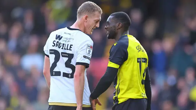 Millwall and Watford players clash