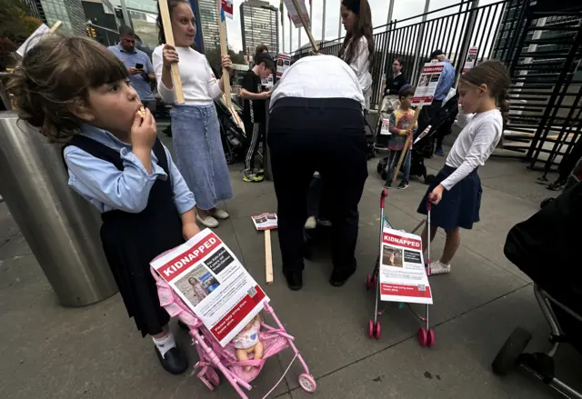 Children push strollers with posters of kidnapped people in Israel as orthodox Jewish families march outside United Nations headquarters while the U.N. General Assembly was meeting in an emergency special session to debate a resolution on the ongoing conflict between Israel and Hamas in New York City, U.S., October 27,