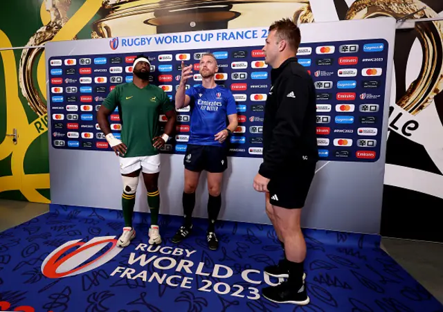 Captains Siya Kolisi of South Africa and Sam Cane of New Zealand join Referee Wayne Barnes