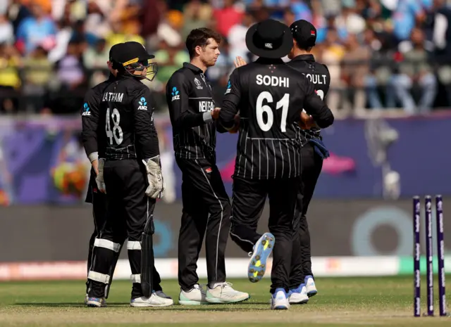 Mitchell Santner celebrates a wicket