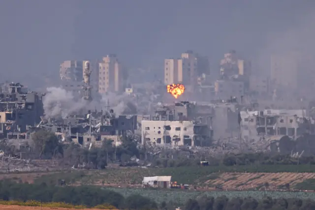 Smoke rises from an explosion in Gaza on October 28, 2023 in Sderot, Israel