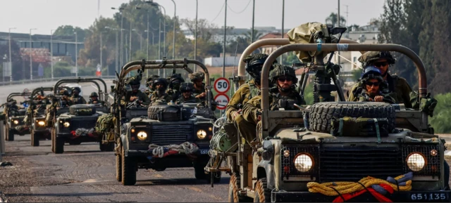 Israeli soldiers patrol on a street in Sderot, near the border with Gaza, in Israel, 28 October