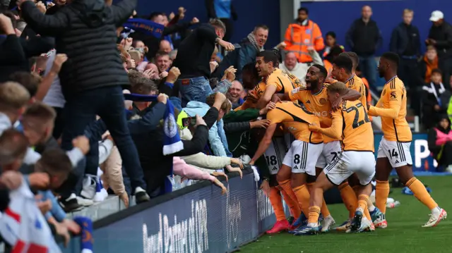 Harry Winks celebrates scoring for Leicester