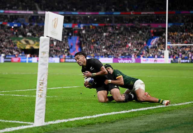 Cheslin Kolbe tackles  Rieko Ioane