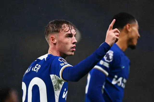 Palmer points to the crowd after scoring v Arsenal.