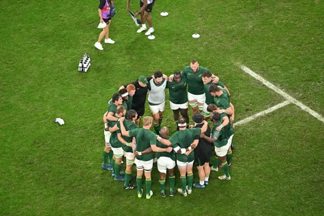 South Africa's players gather in a huddle