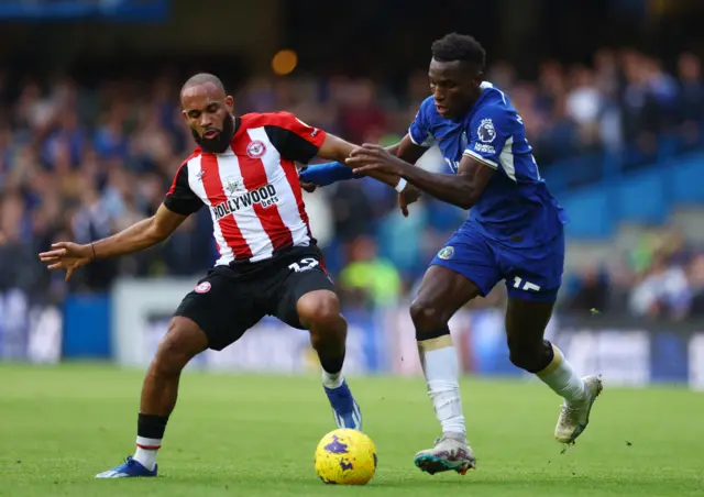 Bryan Mbeumo takes the ball back for Brentford