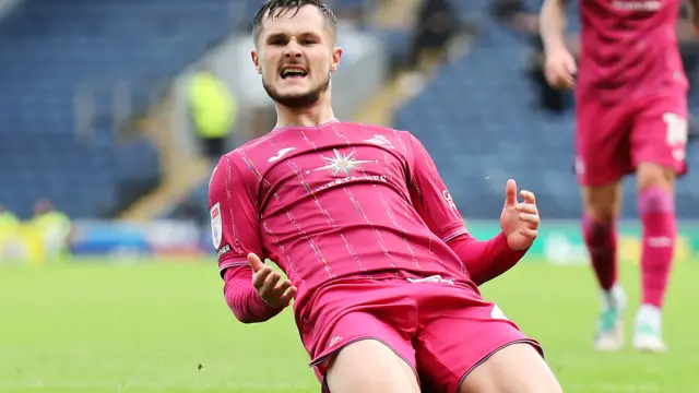 Liam Cullen celebrates scoring for Swansea