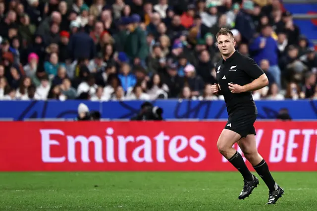 Sam Cane runs off the pitch