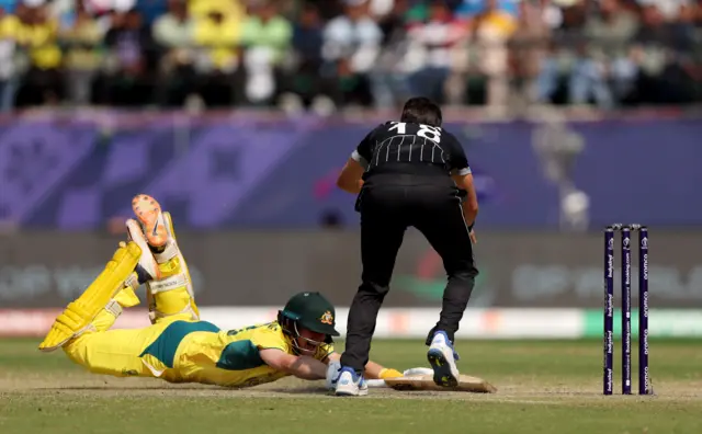 Marnus Labuschagne dives to make his ground