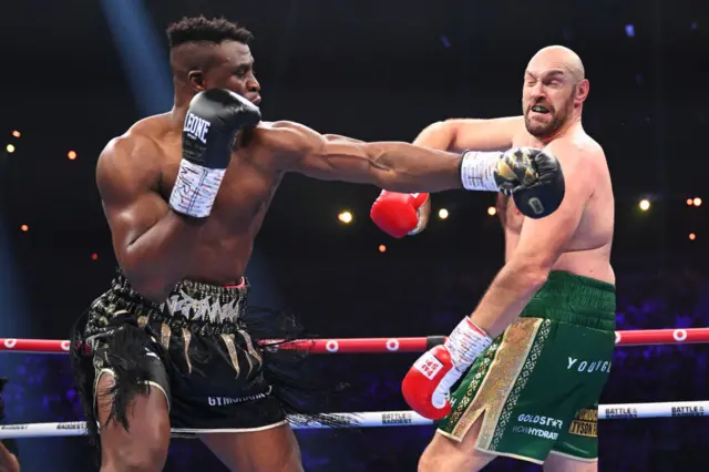 Francis Ngannou lands a left hook on Tyson Fury