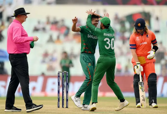 Shoriful Islam and Tanzid Hasan celebrate the wicket of Max O'Dowd