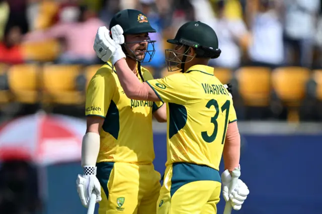 David Warner and Travis Head embrace