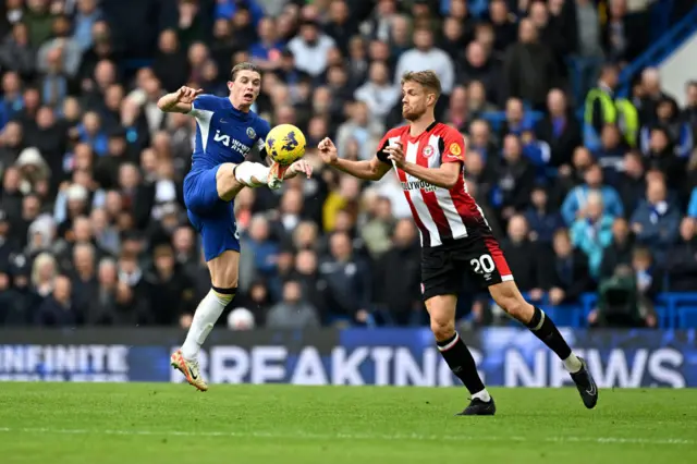 Chelsea's Connor Gallagher reaches for the ball