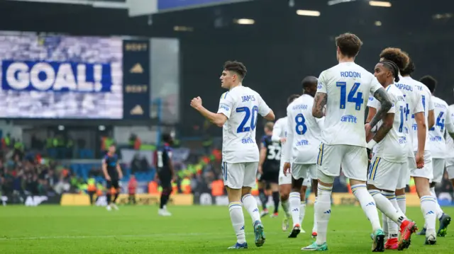 Leeds United celebrate scoring third goal