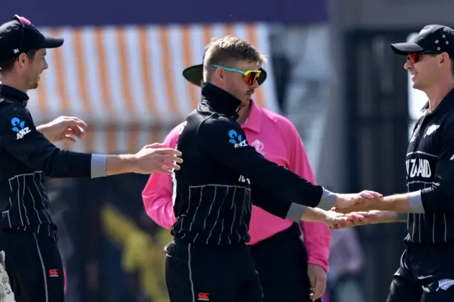 Glenn Phillips celebrates a wicket