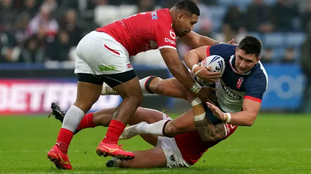 Victor Radley carries the ball for England