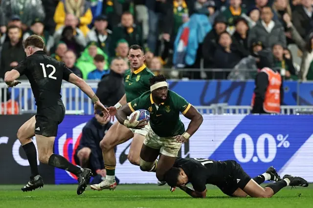 Siya Kolisi is tackled