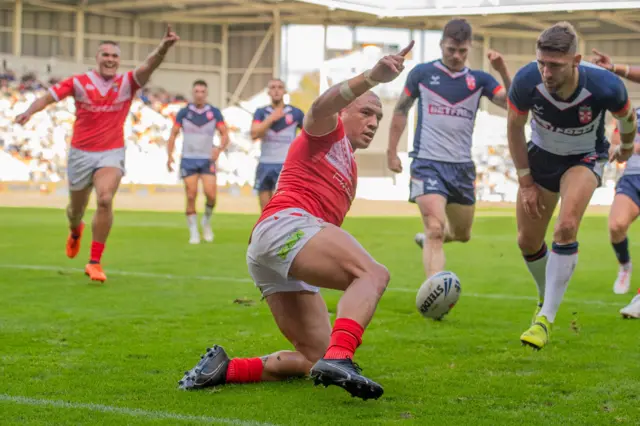 Tyson Frizell scores a try for Tonga