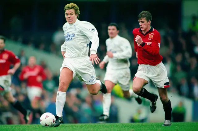 Tomas Brolin and David Beckham compete in the Premier League game between Leeds United and Manchester United