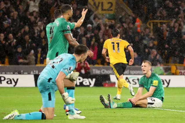 Newcastle players are left strewn across the pitch as Hwang runs off to celebrate.