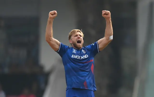 David Willey celebrates the wicket of Virat Kohli