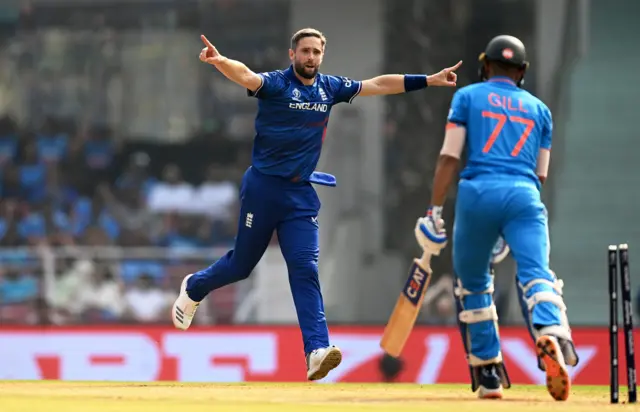 Chris Woakes celebrates the wicket of Shubman Gill