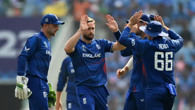 Chris Woakes celebrates the wicket of Shubman Gill