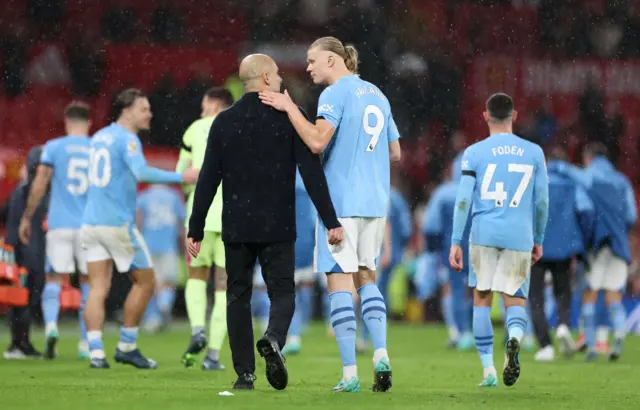 Pep Guardiola and Erling Haaland