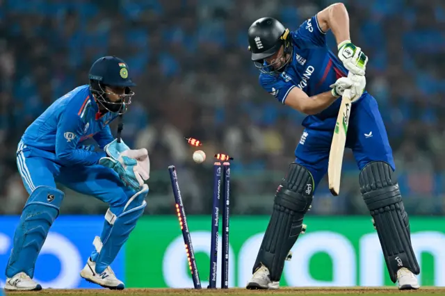 Jos Buttler is bowled by Kuldeep Yadav