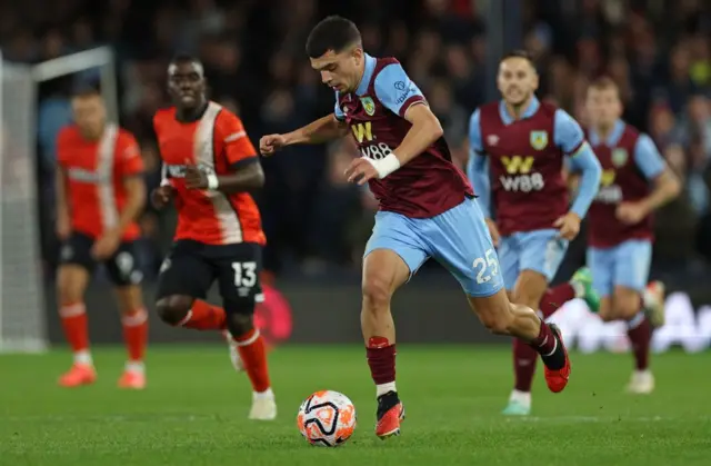 Zeki Amdouni runs with the ball