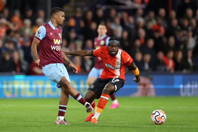 Lyle Foster controls the ball whilst under pressure from Pelly Ruddock Mpanzu