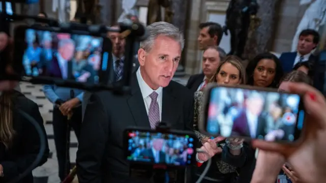 Speaker of the House Kevin McCarthy responds to a question from the news media as he walks to the House floor in the US Capitol in Washington, DC, USA, 02 October 2023.