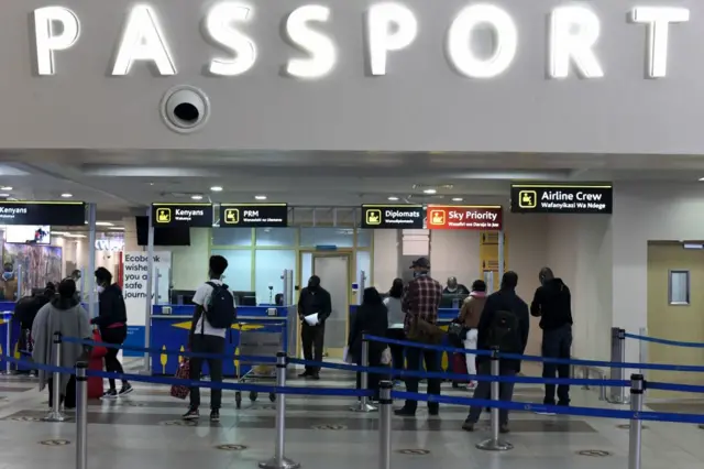 Passengers at passport control desks at the Jomo Kenyatta international airport in Nairobi, Kenya - 2020