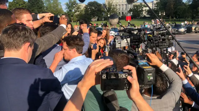 Matt Gaetz is swarmed by media as he leaves Capitol Hill.