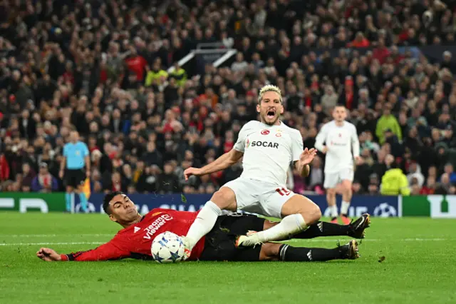 Casemiro of Manchester United fouls Dries Mertens of Galatasaray