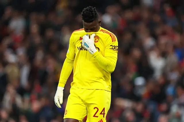 Andre Onana of Manchester United looks deflated