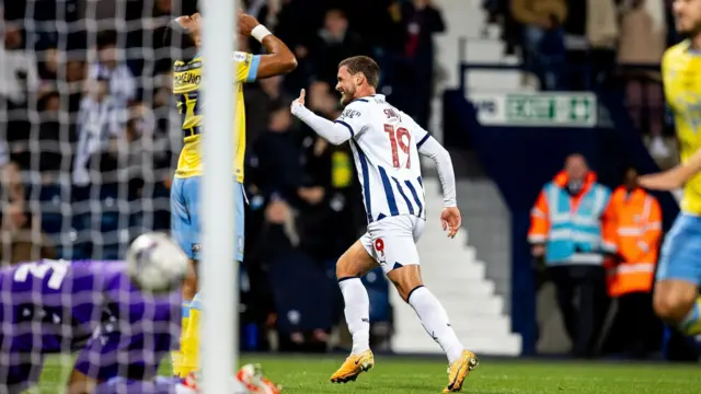 John Swift celebrates scoring for West Brom